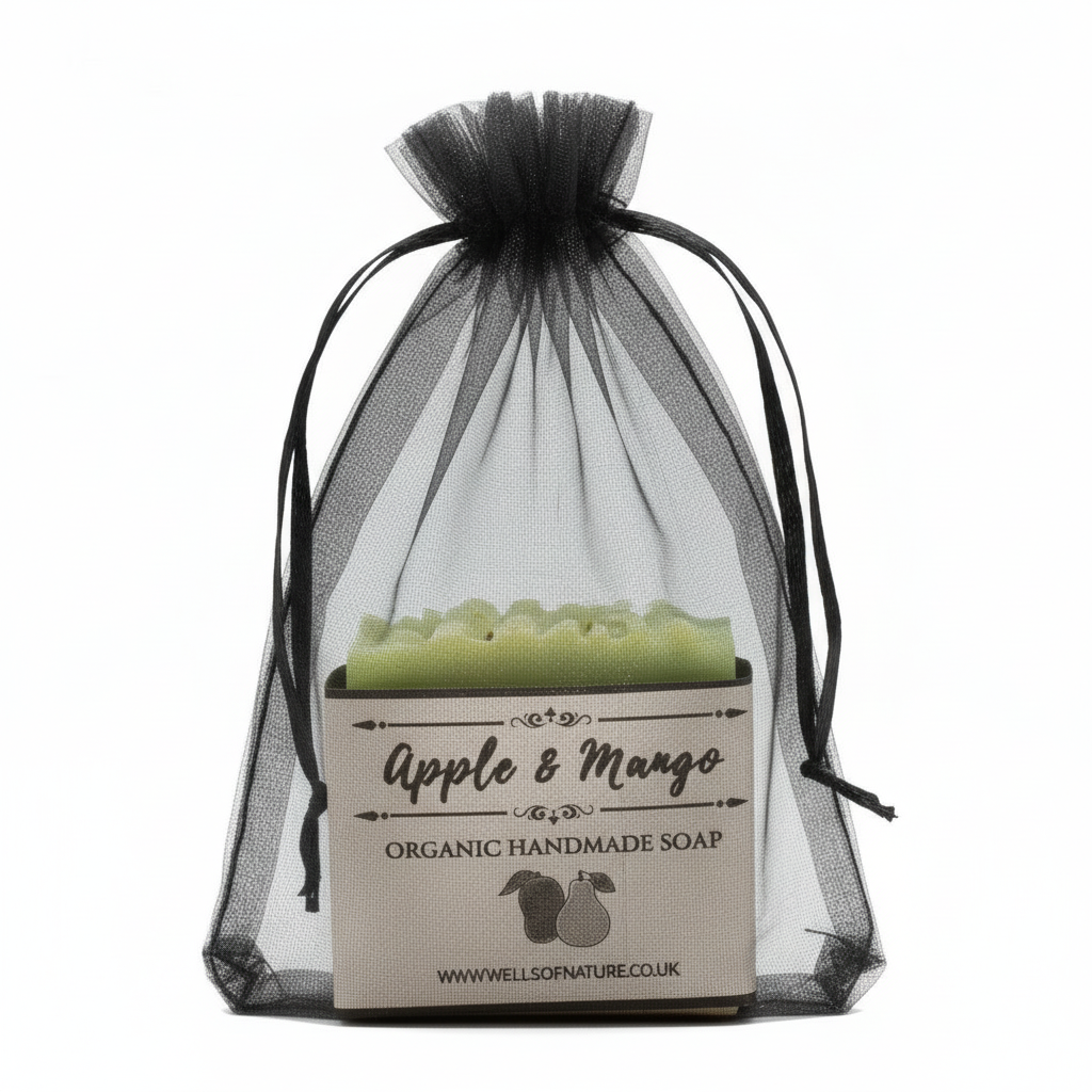 Apple and mango soap with label in black mesh bag